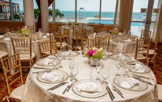Set table in a reception area overlooking the atlantic ocean.