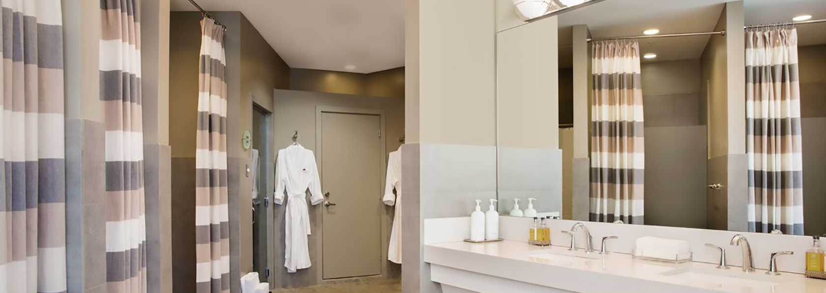 Aquanox Spa bathroom with robe hanging on door